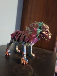 Image 1 of Bone lion