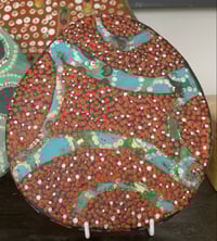 Painted red ceramic.