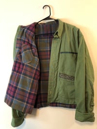Image of Green twill coat with jewel-tone flannel lining