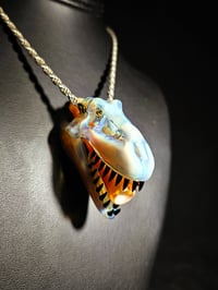 Image 1 of Mirage (CFL) T-Rex skull pendant with serendipity joint tip.