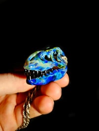 Image 2 of Blue amber purple T-Rex skull pendant with galaxy teeth