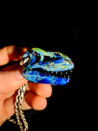 Image 3 of Blue amber purple T-Rex skull pendant with galaxy teeth