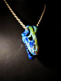 Image 4 of Blue amber purple T-Rex skull pendant with galaxy teeth