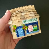 Image 8 of "In Stitches"  quilt shop pincushion
