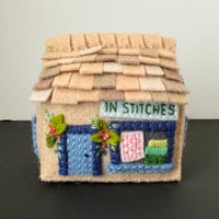 Image 1 of "In Stitches"  quilt shop pincushion