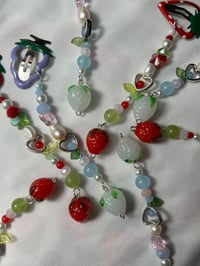 grape and strawberry hair clips