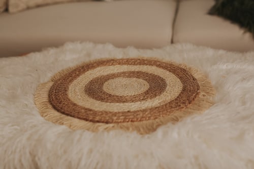 Image of jute layering rugs