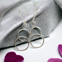 Image 1 of Vintage double ring sterling silver spoon earrings.