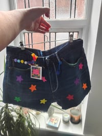 Image 1 of Vintage levi cut offs - waist 34 inches -stars