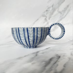 Image of Blue Stoneware tea cup - White Foliage