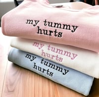 My tummy hurts sweater