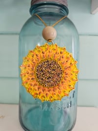 3" sunflower car freshie scented in birthday cake 