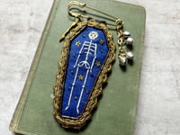 Image 1 of Blue Skeleton Pin Brooch with Bells & Arrow Charm BROOCH