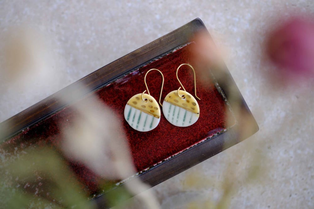 Image of  Round Mustard Lustre Earring