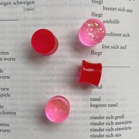 Image 1 of 12mm plugs 