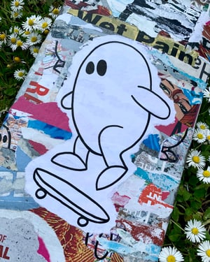 “Skate through the noise.” Recycled Skateboard Art Piece