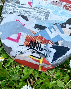 “Skate through the noise.” Recycled Skateboard Art Piece