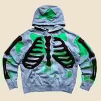 Image 1 of REWORKED NIKE HOLES SKELETON HOODIE SIZE M