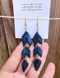 Image 1 of Blue or White Raven Feather Earrings (with gold dipped Hematite) 