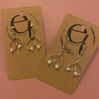 Image 1 of breast earrings