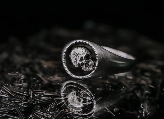 Image of Palm Skull Ring