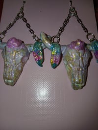 Image 1 of Pink and teal or black bull earrings
