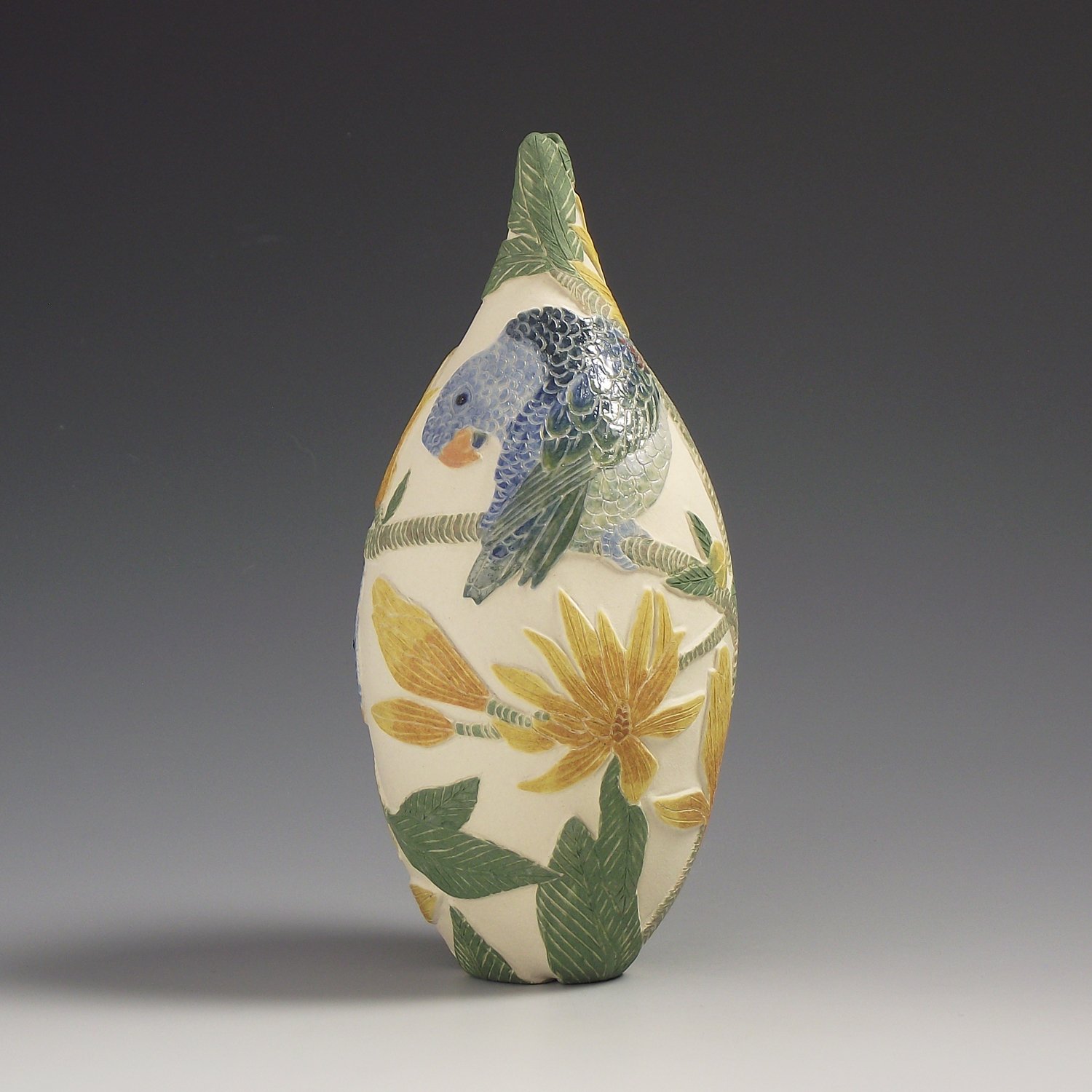 Image of Blue Rumped Parrots & magnolia