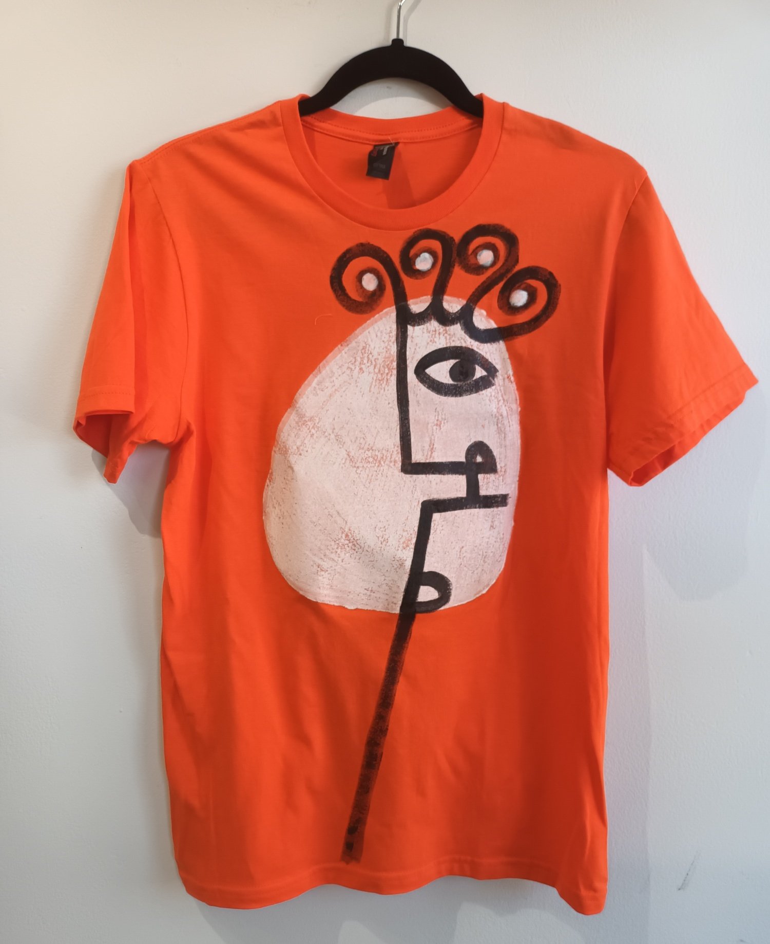Image of orange painted shirt...small