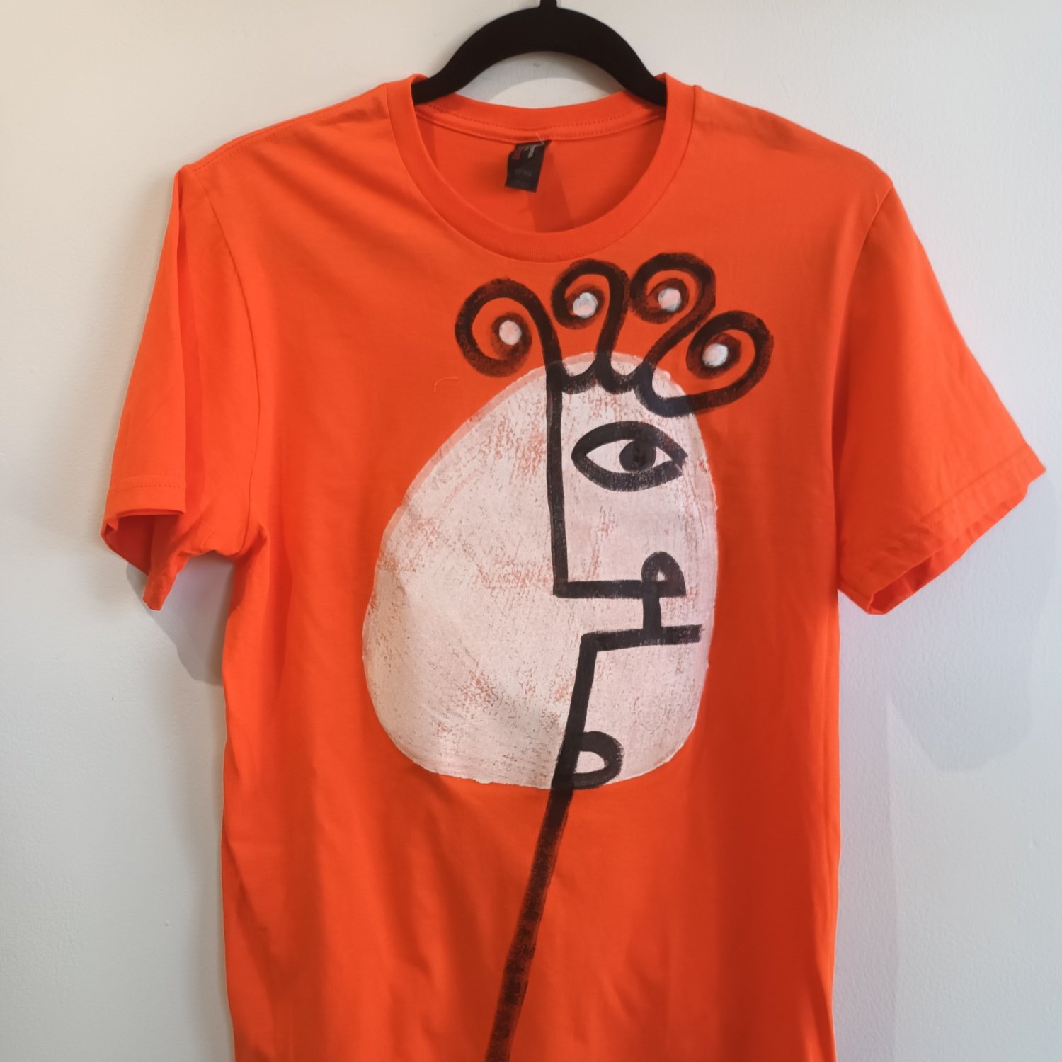 Image of orange painted shirt...small