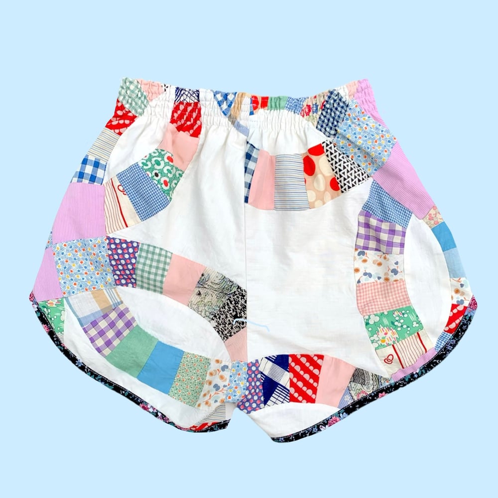 Image of Retro Quilted Jogger Shorts — Double Wedding Ring & Black Floral Trim