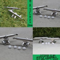 2 Trucks 34mm + 4 bushings + 1 Tool + 9 vis pour embase