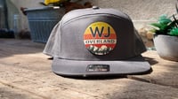 Image 1 of grey WJ Overland grey snap back with sunset logo