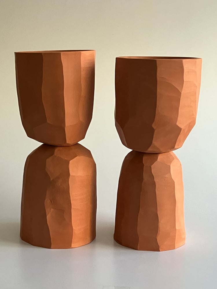 Image of a pair of terracotta flowerpots