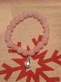 pink charm bracelet