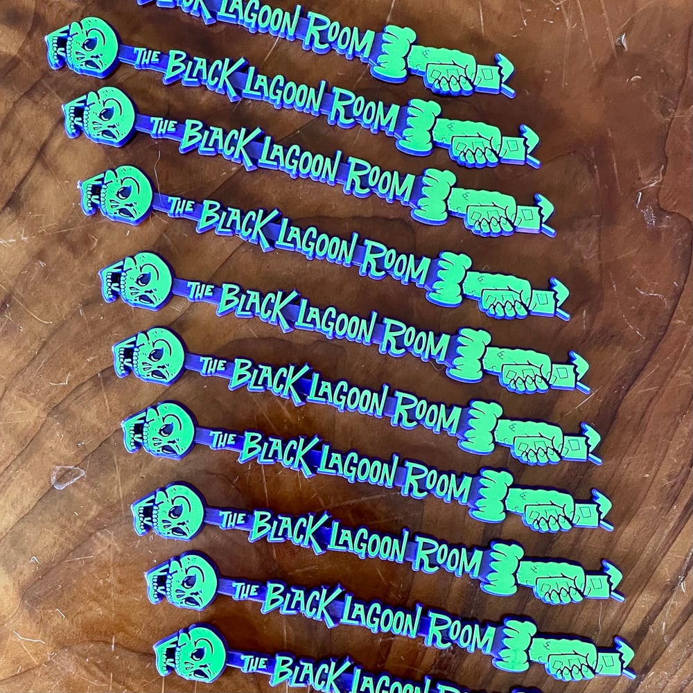 BLACK LAGOON ROOM 7.5" Logo Swizzle Sticks - Dark Purple & Neon Green