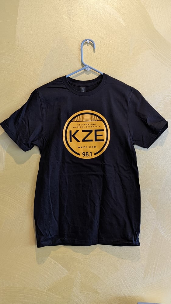 Image of T-shirt: black with logo with yellow background