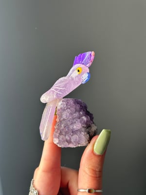 HAND CARVED SELF STANDING BIRDS ON AMETHYST BASES