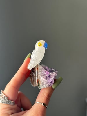 HAND CARVED SELF STANDING BIRDS ON AMETHYST BASES