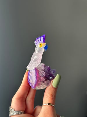 HAND CARVED SELF STANDING BIRDS ON AMETHYST BASES