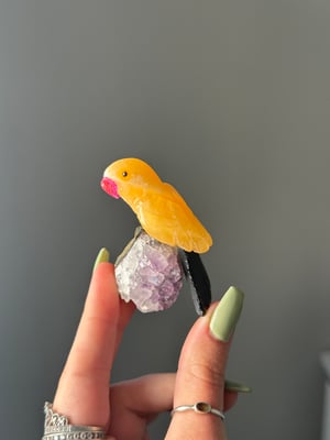 HAND CARVED SELF STANDING BIRDS ON AMETHYST BASES