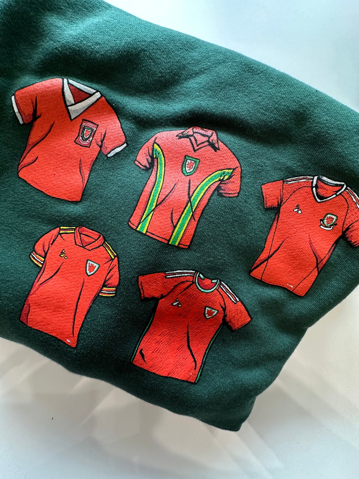 Image of ‘Five Welsh Shirts’ Unisex Sweatshirt in Bottle Green 