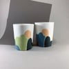 Set de deux gobelets en porcelaine 99