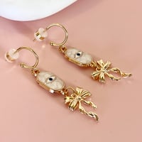 Image 4 of Eye and Bow Half Hoops