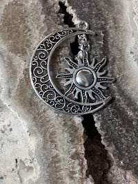 Large Moon and dangling sun trinket