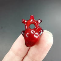 Image 1 of Little big deep red anatomical heart pendant