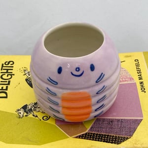 Image of Little lilac caterpillar pot