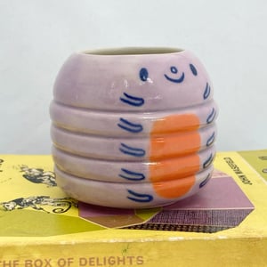 Image of Little lilac caterpillar pot