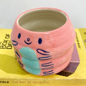 Image of Pink and blue caterpillar pot 