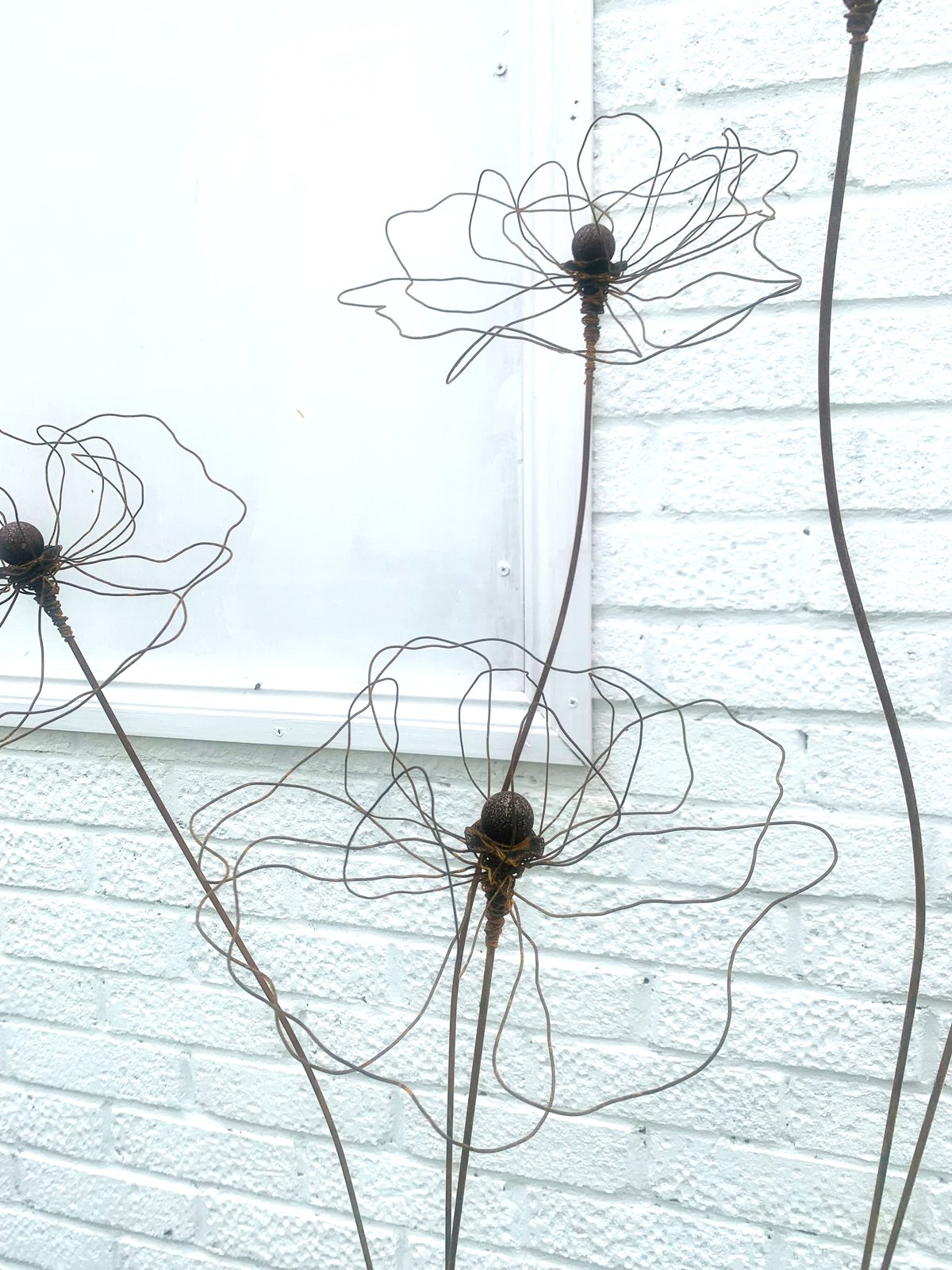 Triple peony plant stake and sculpture