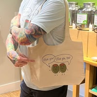 Image 1 of Olive You Tote with inside pocket and pleated bottom. 